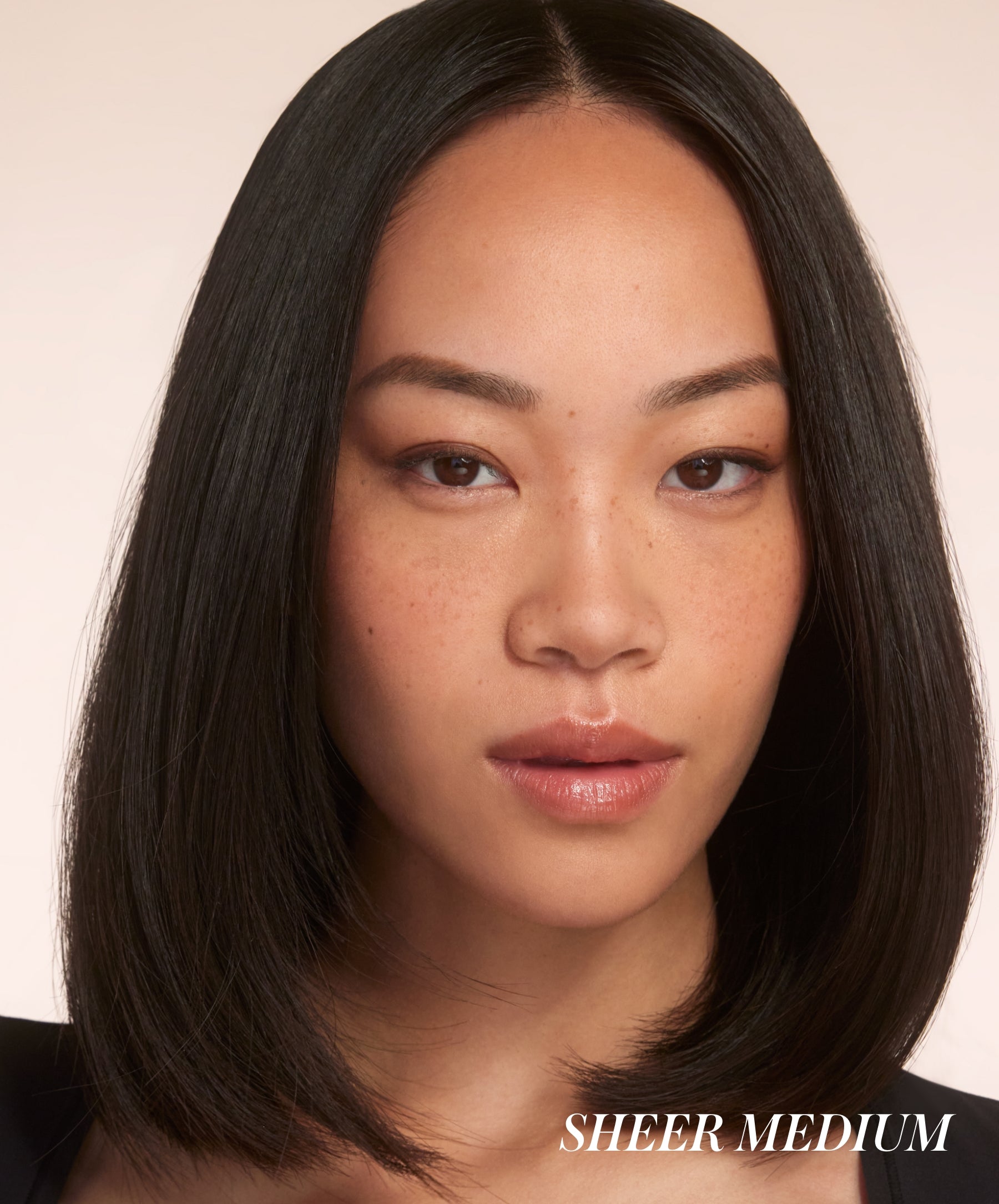 Model wearing the shade Sheer Medium RMS Hydra Setting Powder