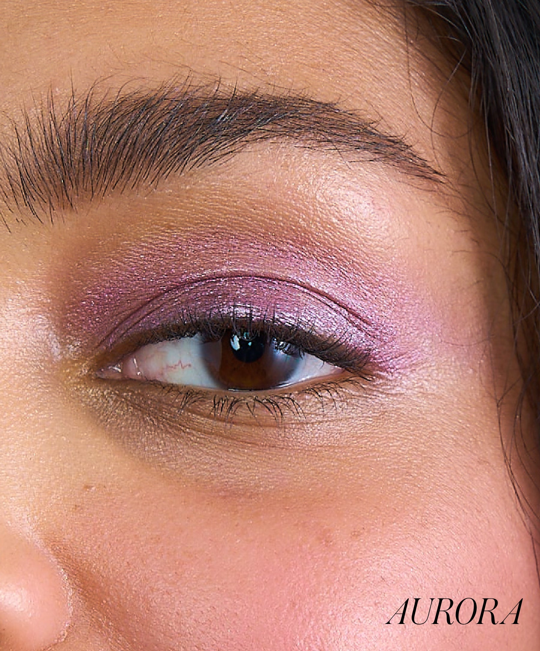 Close-up of model wearing RMS Eyelights Cream Eyeshadow shade Aurora