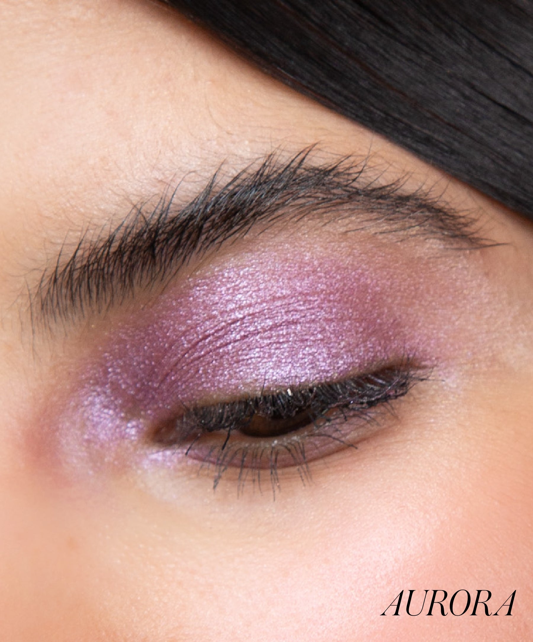 Close-up of model wearing RMS Eyelights Cream Eyeshadow shade Aurora
