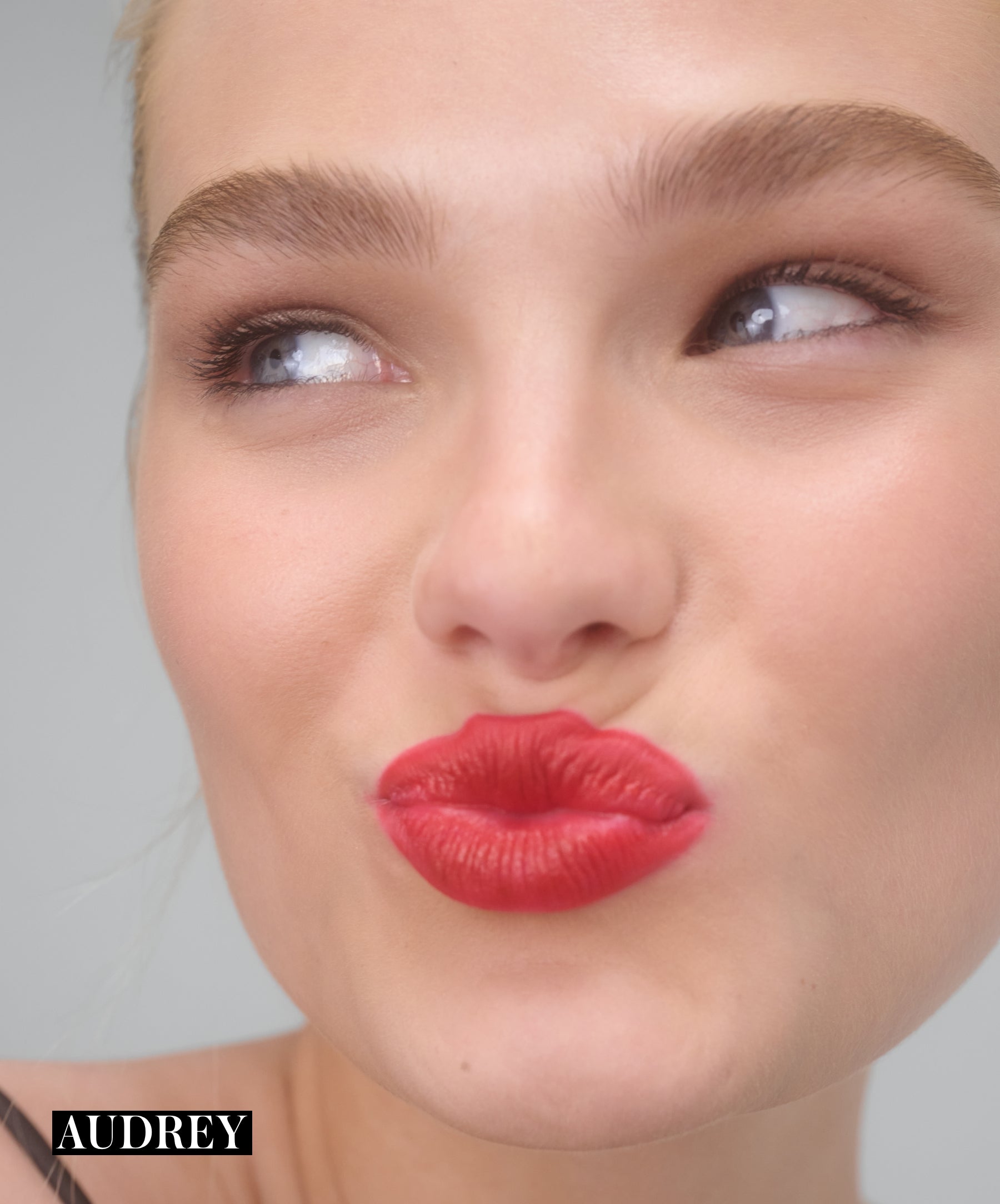 Model wearing RMS Legendary Serum Lipstick in shade Audrey