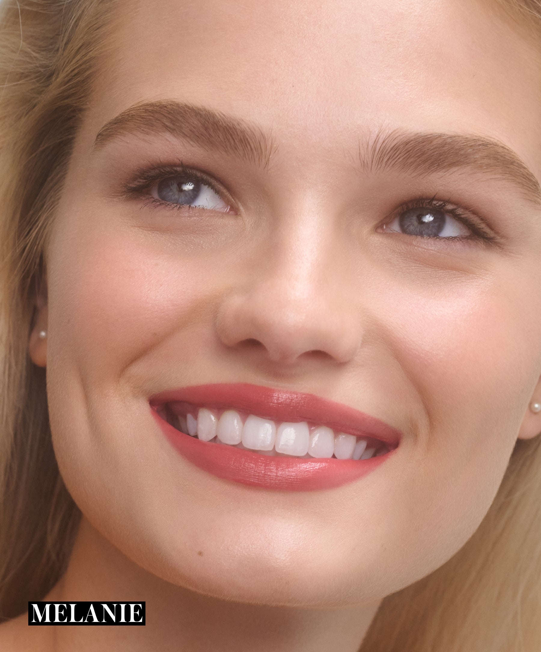 Model wearing RMS Legendary Serum Lipstick in shade Melanie