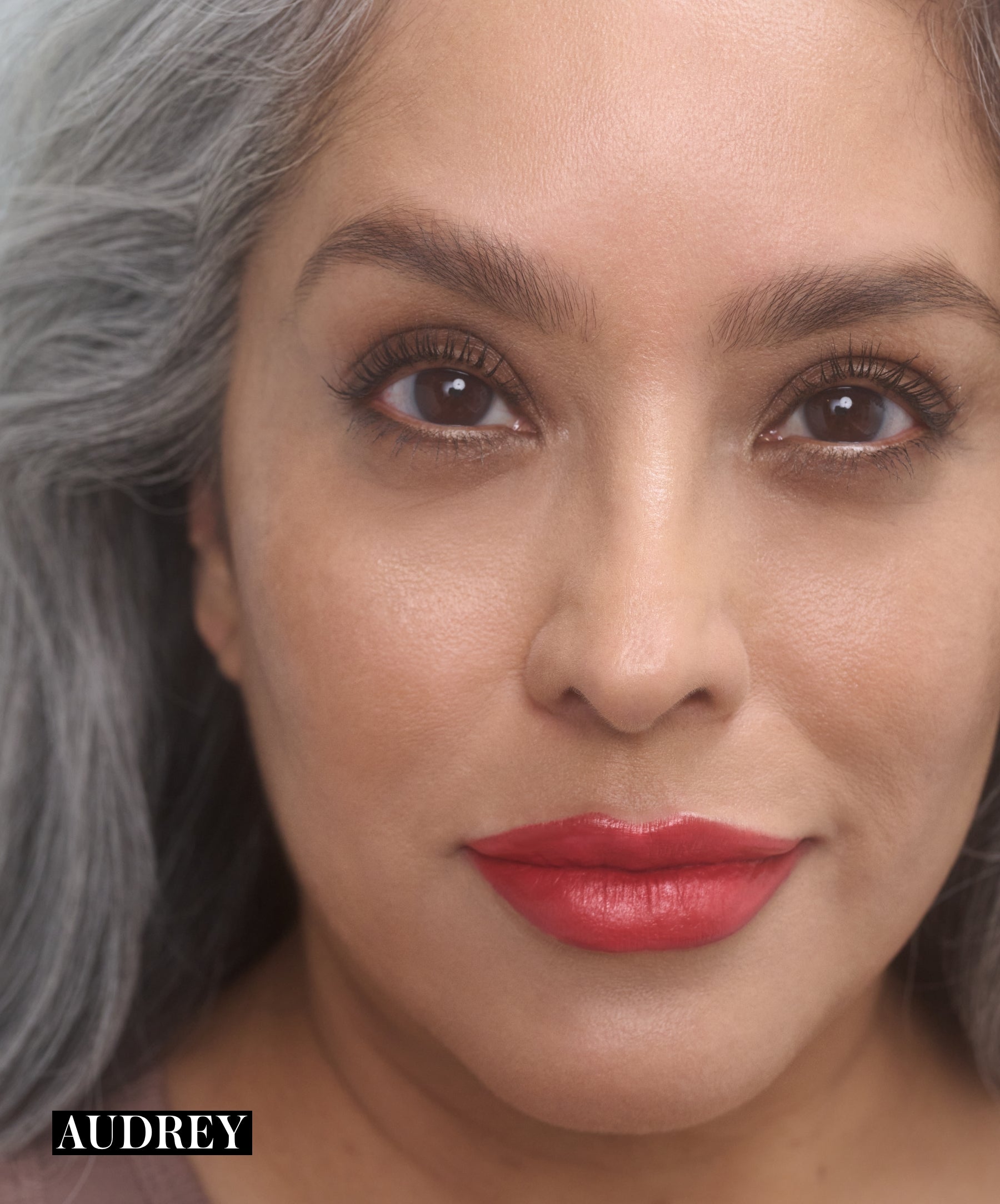 Model wearing RMS Legendary Serum Lipstick in shade Audrey