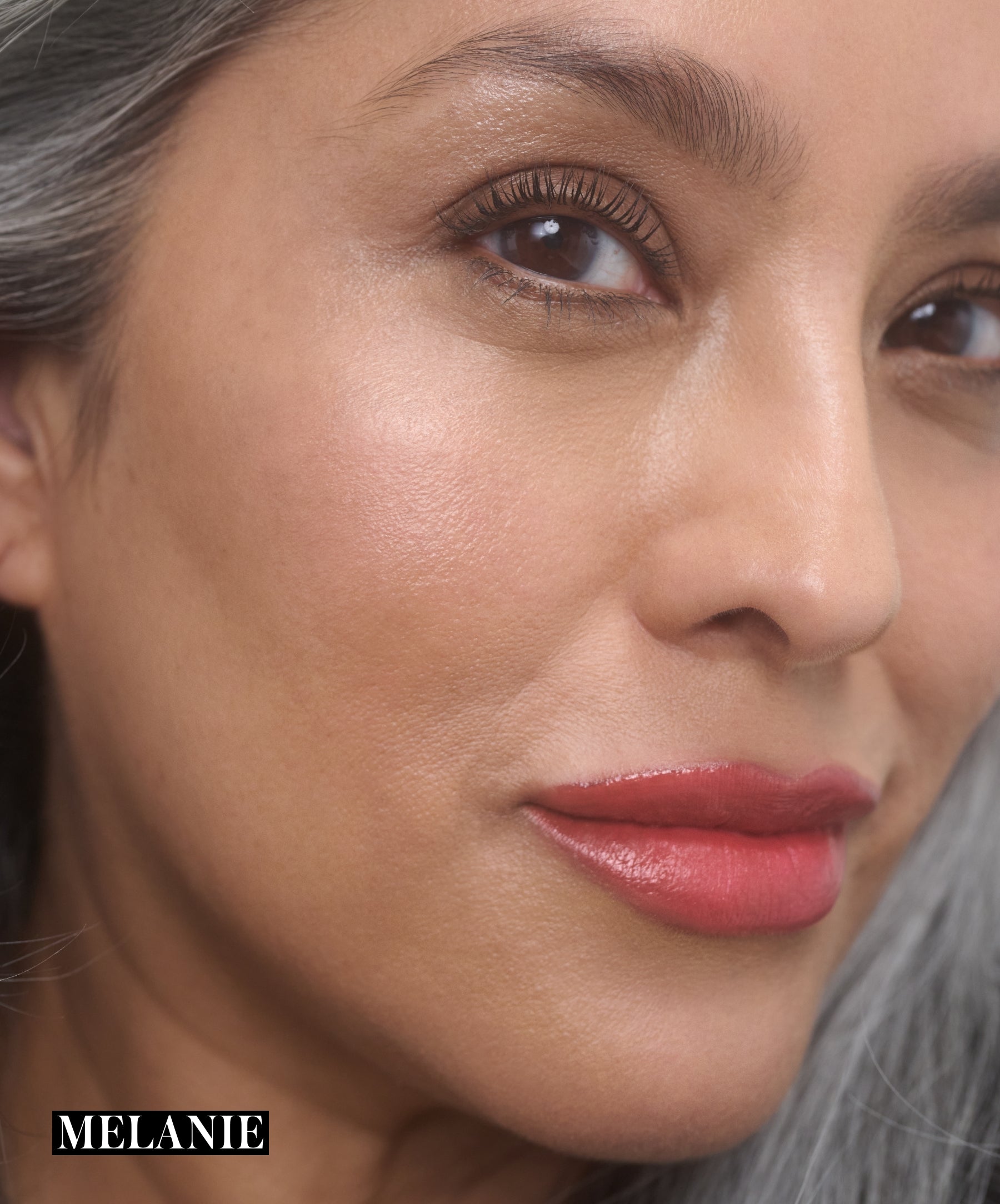 Model wearing RMS Legendary Serum Lipstick in shade Melanie