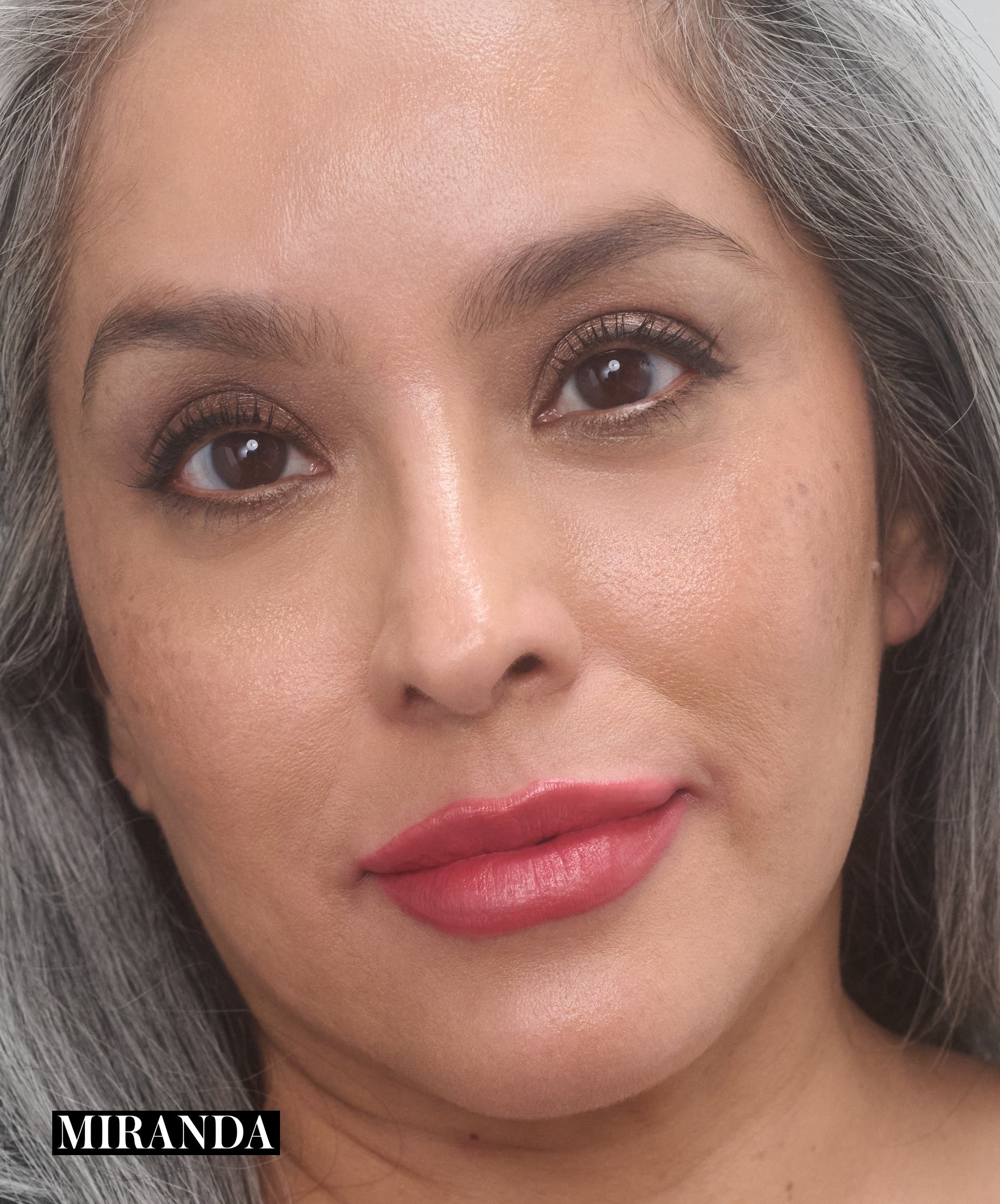 Model wearing RMS Legendary Serum Lipstick in shade Miranda