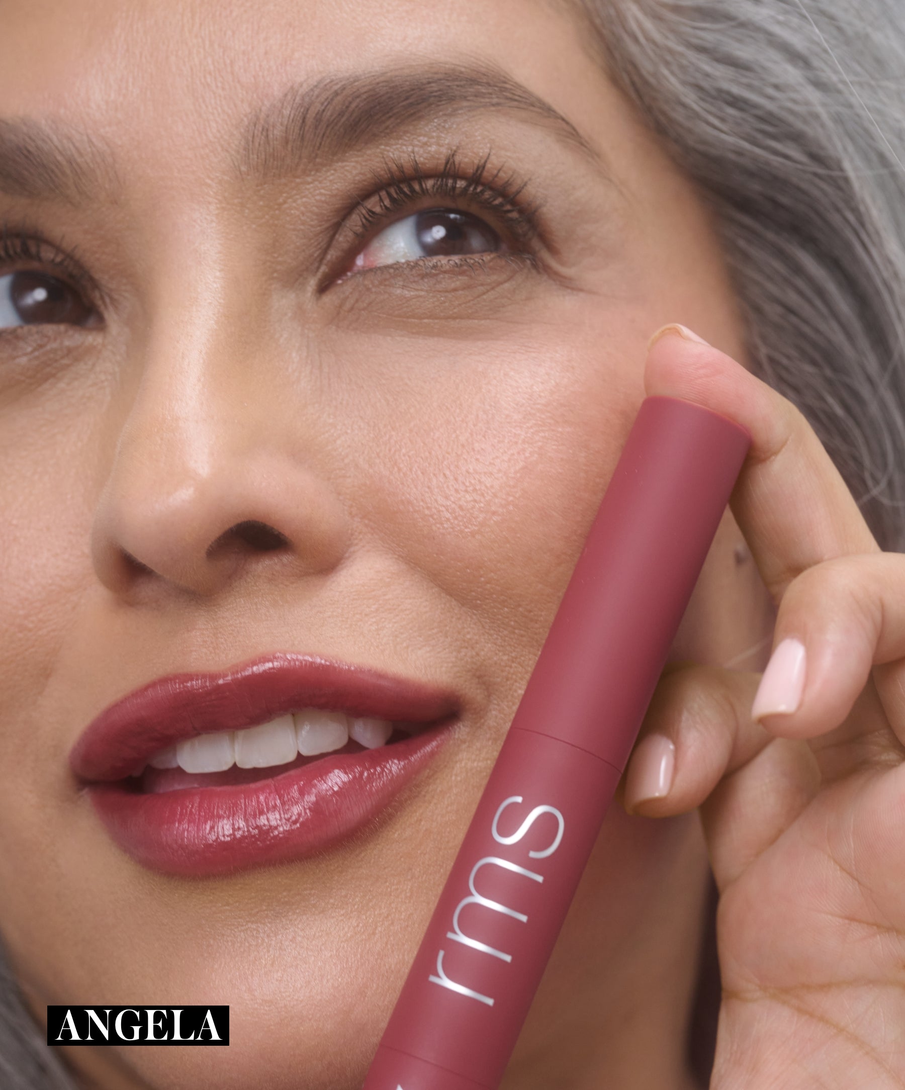 Model wearing RMS Legendary Serum Lipstick in shade Angela