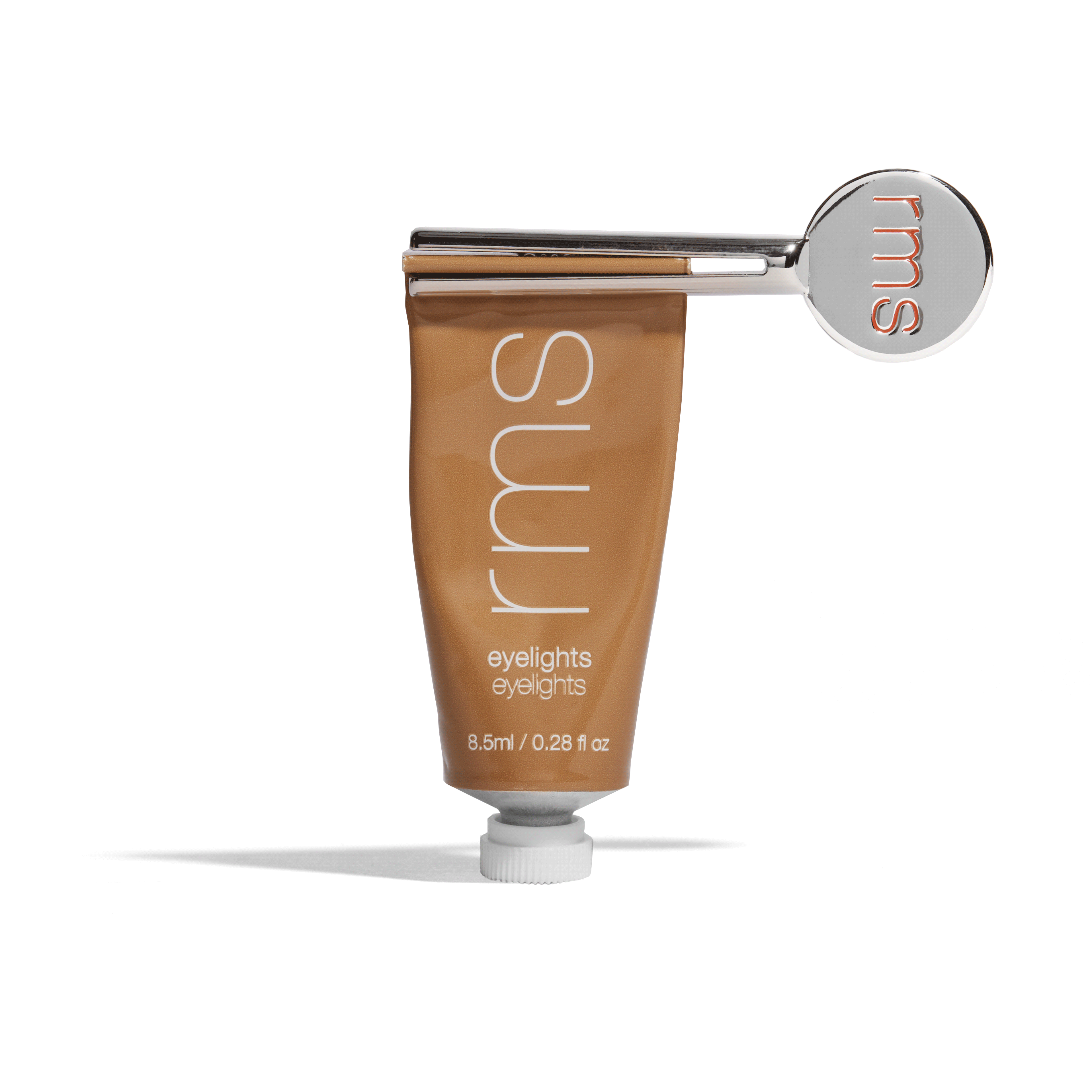 GIF of RMS Reusable Metal Tube Key twisting slowly to dispense Eyelights Cream Eyeshadow