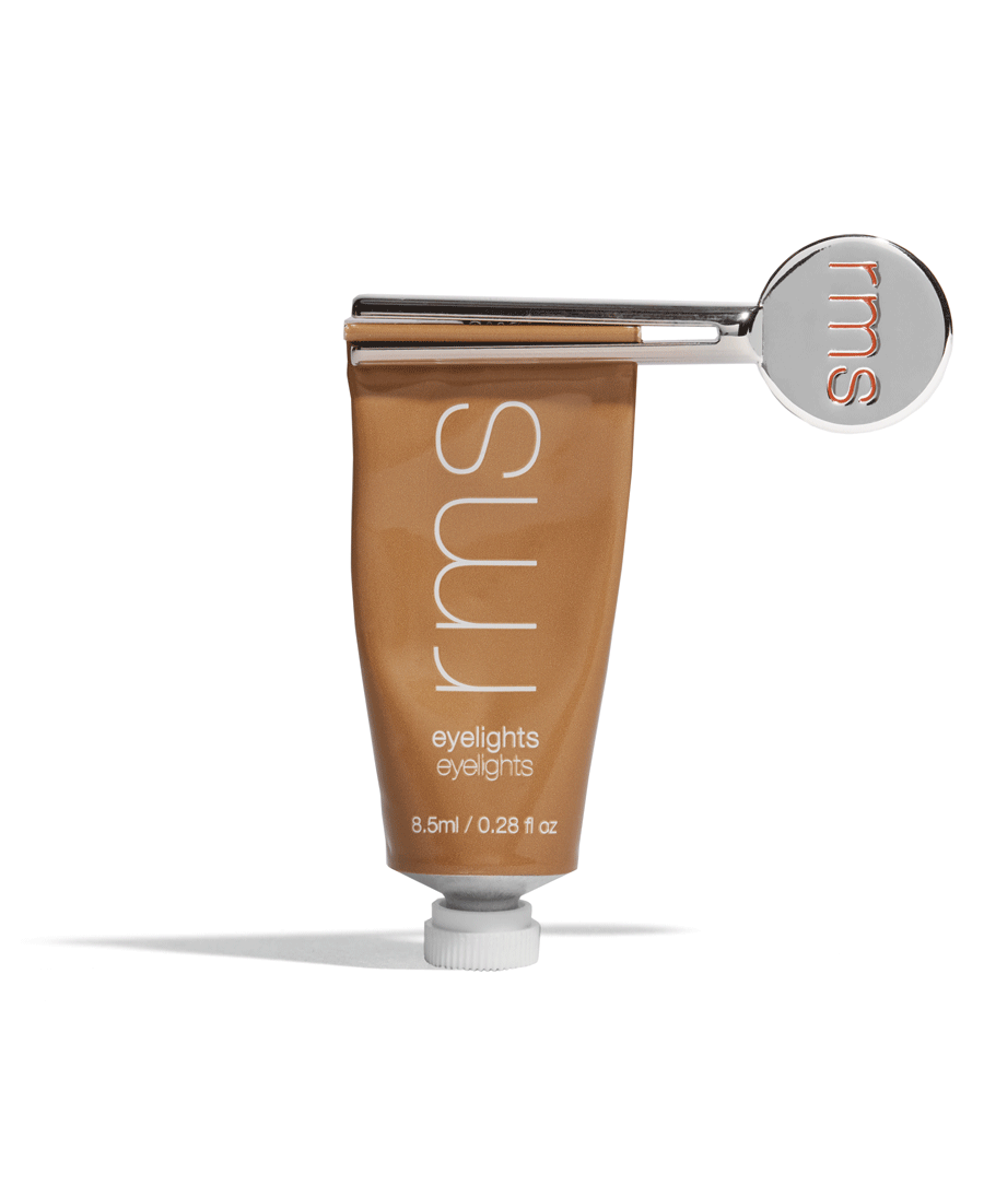 GIF of RMS Reusable Metal Tube Key twisting slowly to dispense Eyelights Cream Eyeshadow