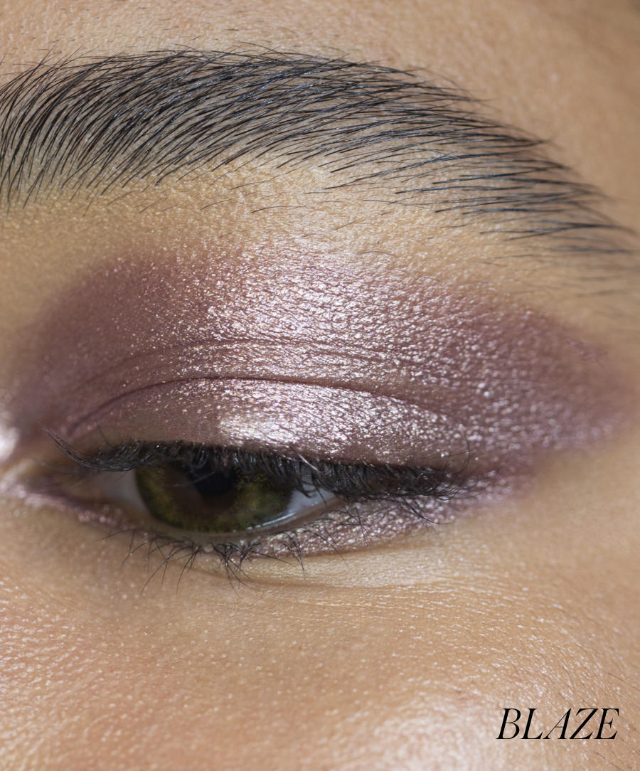 Close-up of model wearing RMS Eyelights Cream Eyeshadow in shade Blaze