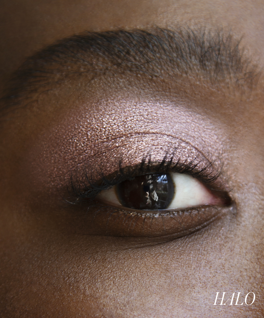 Close-up of model wearing RMS Eyelights Cream Eyeshadow in shade Halo
