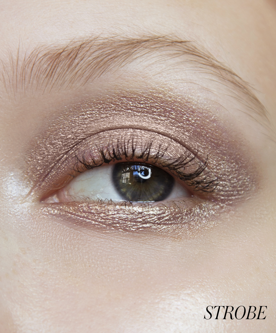 Close-up of model wearing RMS Eyelights Cream Eyeshadow in shade Strobe