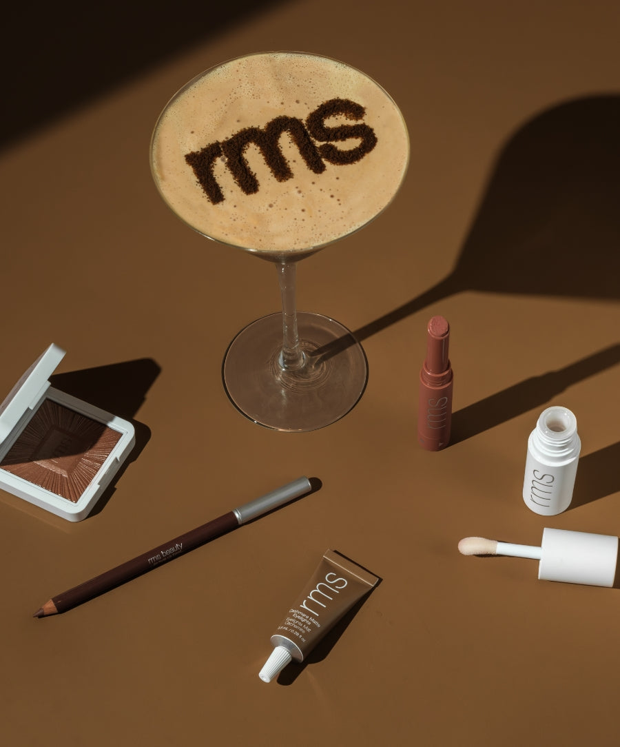 Color Capsule: Espresso Martini by RMS Beauty with warm brown makeup shades styled beside an espresso martini cocktail and skincare infused makeup products
