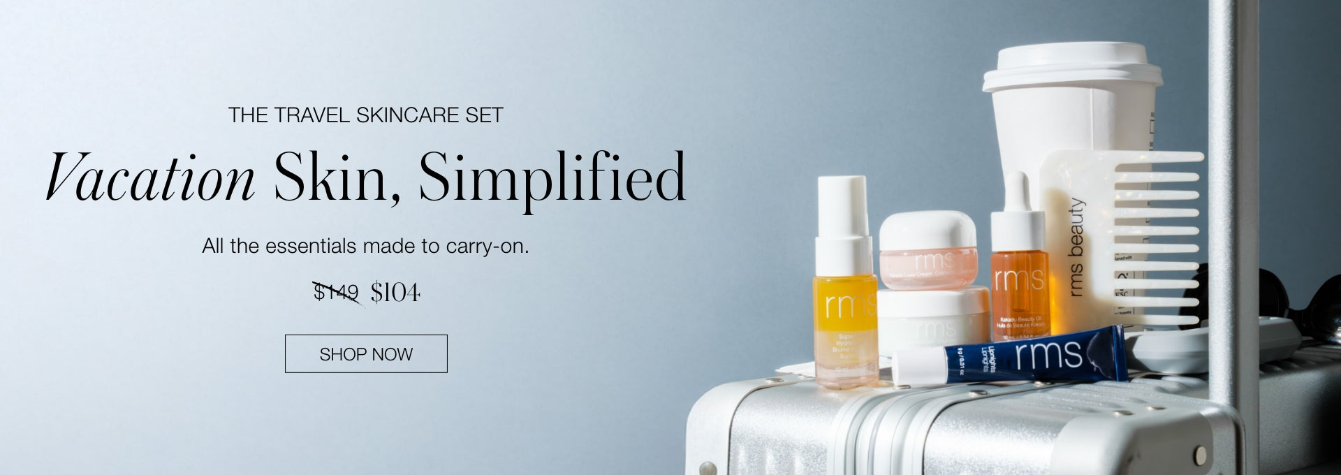 A travel skincare set featuring multiple skincare bottles and jars arranged on top of a white suitcase next to a disposable coffee cup and a white comb against a light blue background with the text "Vacation Skin, Simplified.