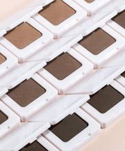 Back2Brow Powder Placed vertically in rows of three. First row is shade Light, second row is shade medium, third row is shade dark. 