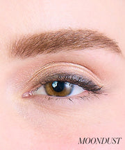 Close-up of model wearing RMS Eyelights Cream Eyeshadow shade Moondust